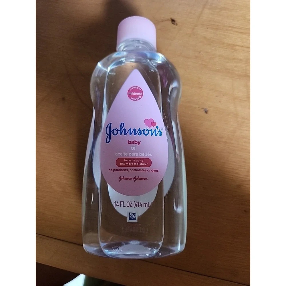 Johnson's Baby Oil , Original Mineral Oil Scented 10 times more moisture, 14 oz.